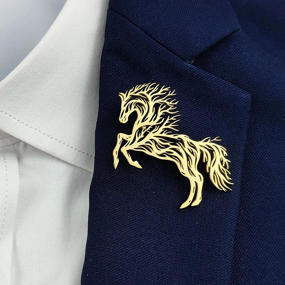 Gold horse-shaped lapel pin on a navy blazer