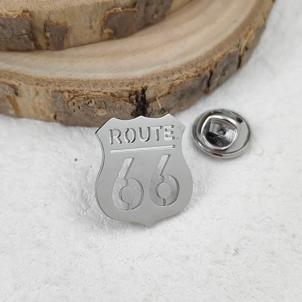 Route 66 Brooch Pin in gold & silver – stainless steel highway lapel pin, road trip gift for bikers, travelers, and adventure lovers.