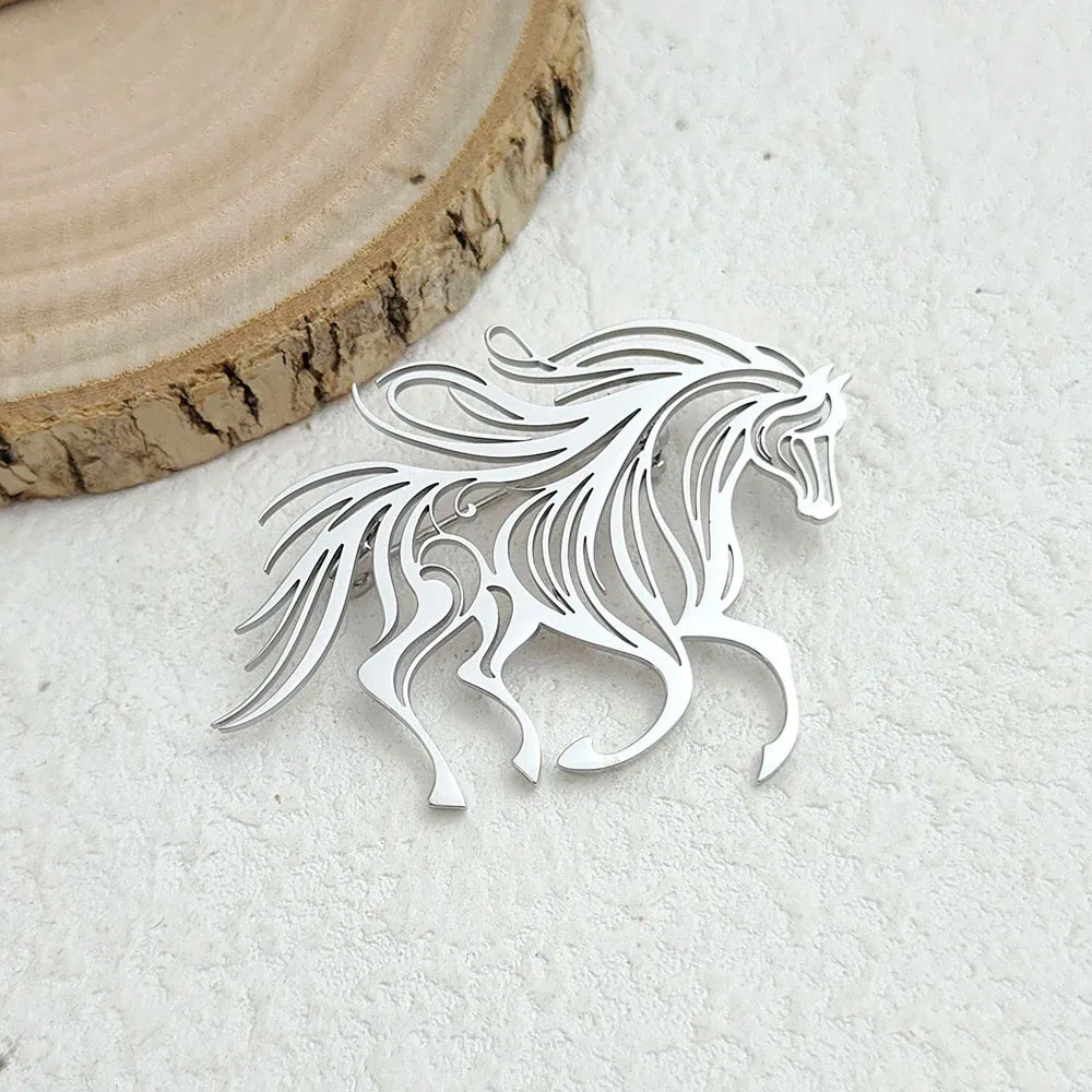 Silver horse-shaped object on a light background