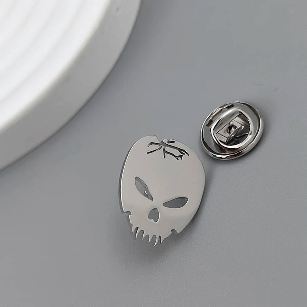 Skull and Tooth Lapel Pin